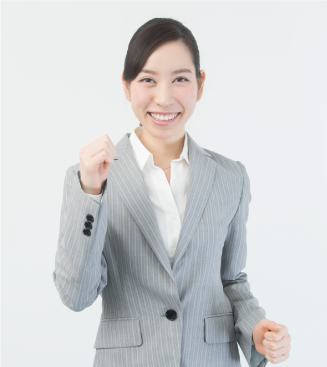 ガッツポーズしている女性